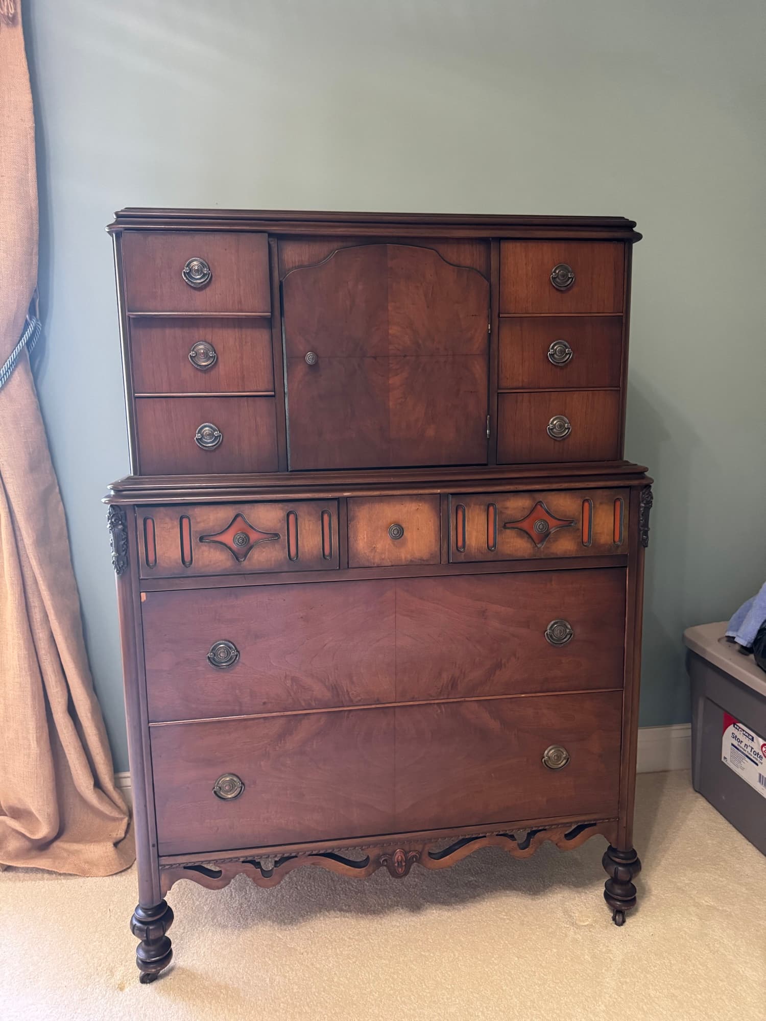 Antique 1920s walnut chest on chest photographed in the seller's bedroom before sale